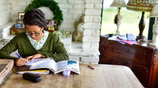 Teens at home learning and doing homework studies