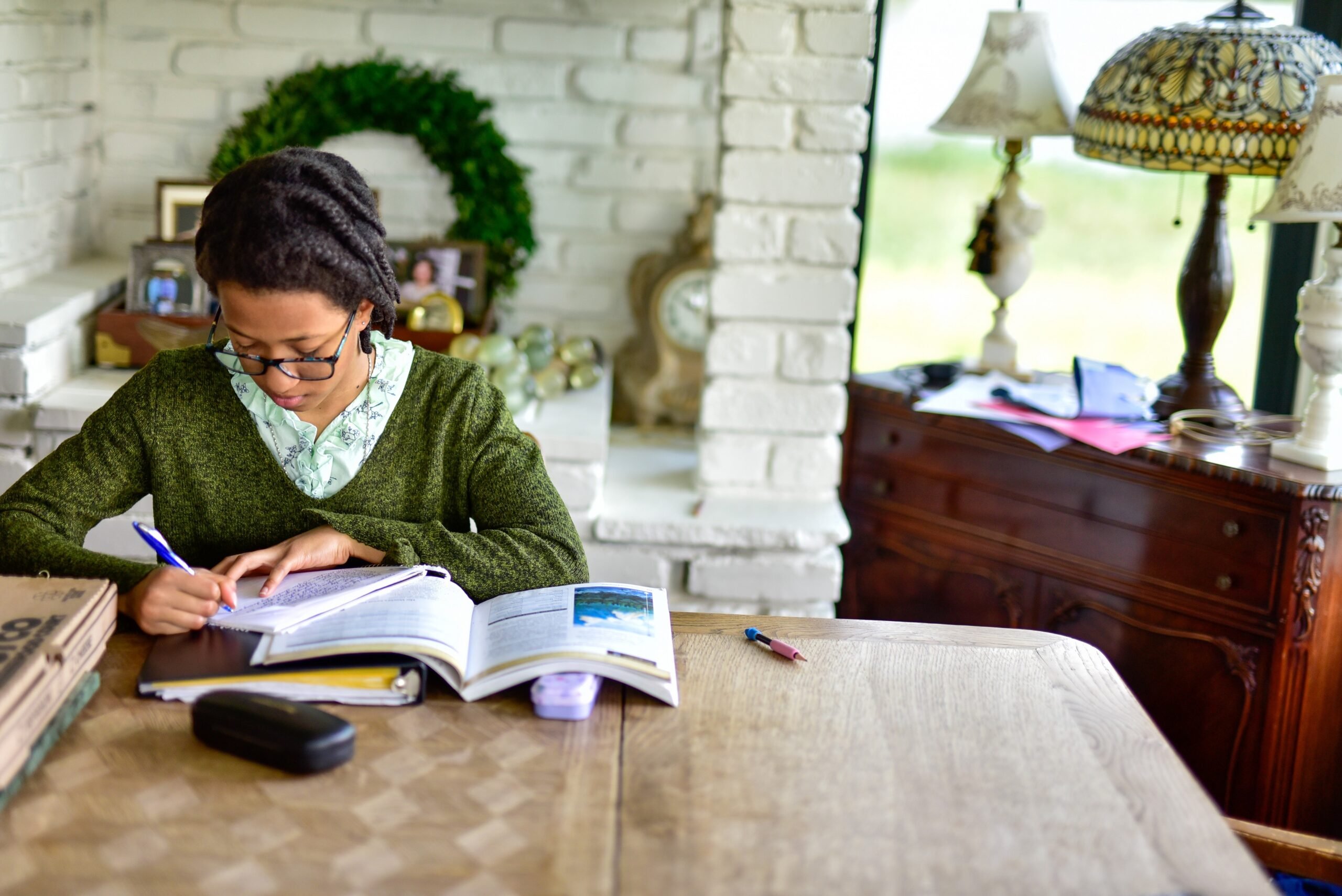 Teens at home learning and doing homework studies