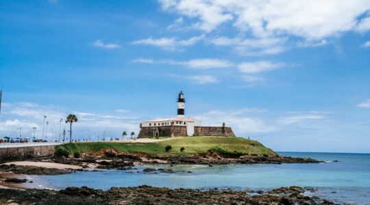 Long shot of Bahia Nautico Museum in Salvdor, Brazil, under cloudy blue skies