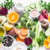 Five best vitamins for beautiful skin. Products with vitamins A, B, C, E, K – broccoli, sweet potatoes, orange, avocado, spinach, peppers, olive oil, dairy, beets, cucumber, beens. Flat lay, top view