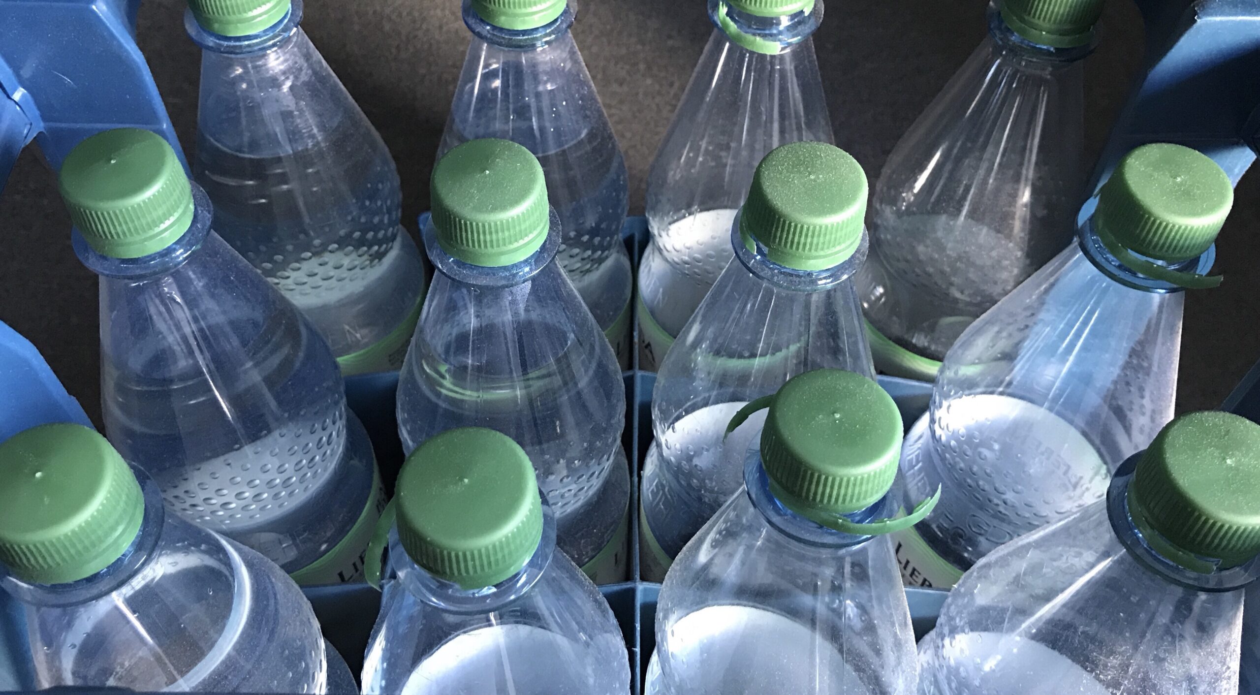 view-from-above-box-of-water-bottles-2023-11-27-05-09-05-utc