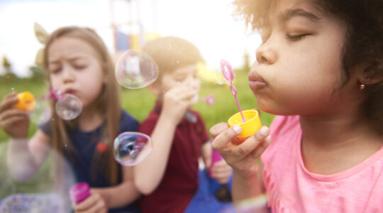 Blowing the bubbles with my friends