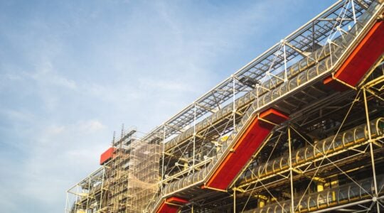 Centre Pompidou under a blue sky and sunlight during daytime in Paris in France