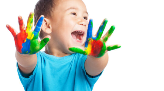 cheerful child with painted hands on white background