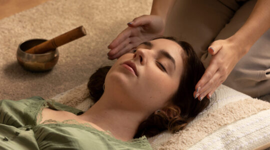 person-conducting-reiki-therapy
