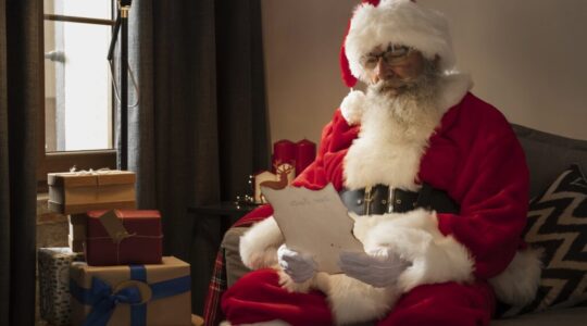 front-view-santa-claus-checking-his-list