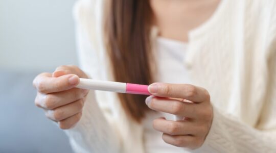 Close-up,Young,Woman,Checking,On,The,Pregnancy,Test,And,The