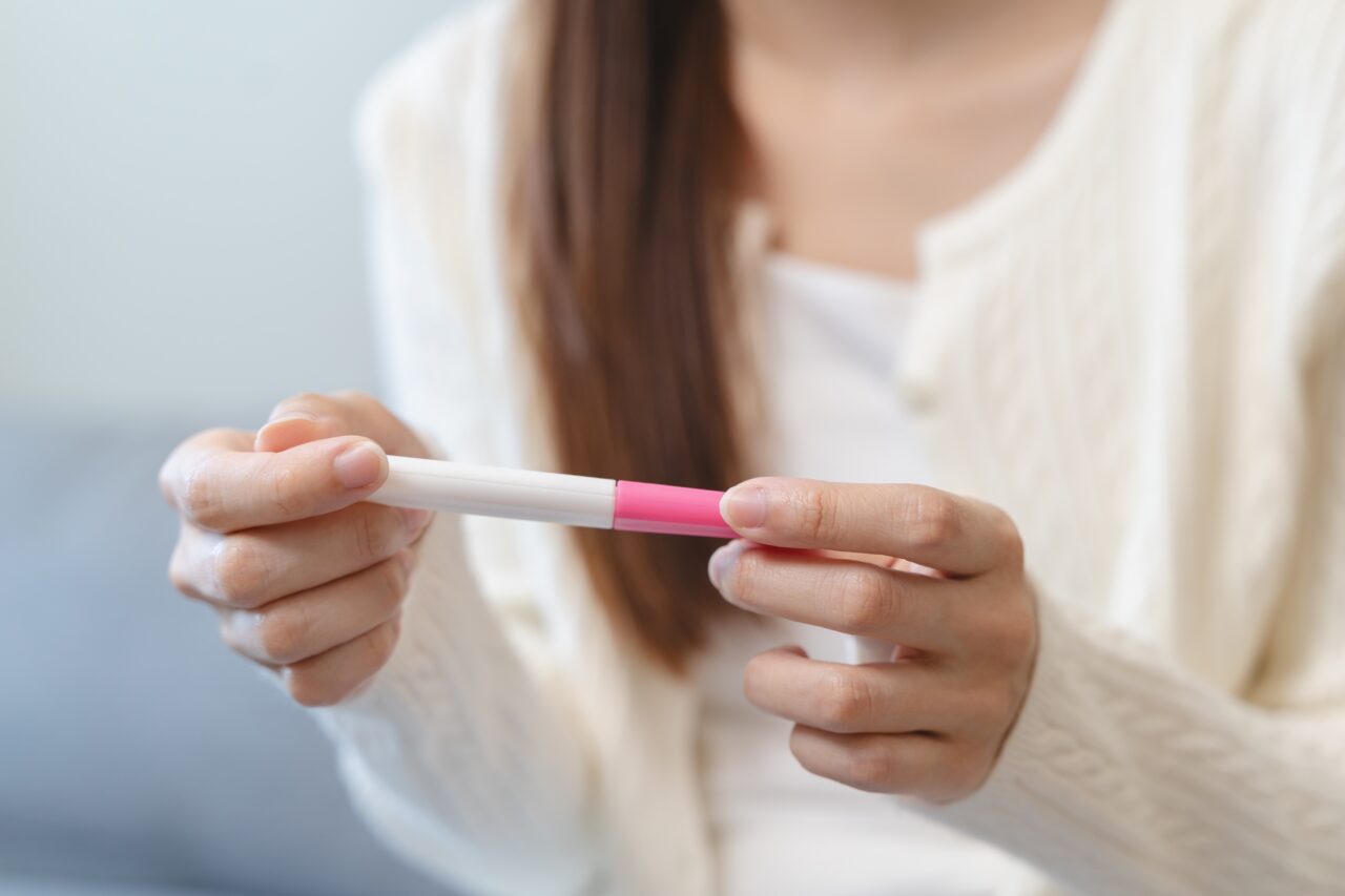Close-up,Young,Woman,Checking,On,The,Pregnancy,Test,And,The
