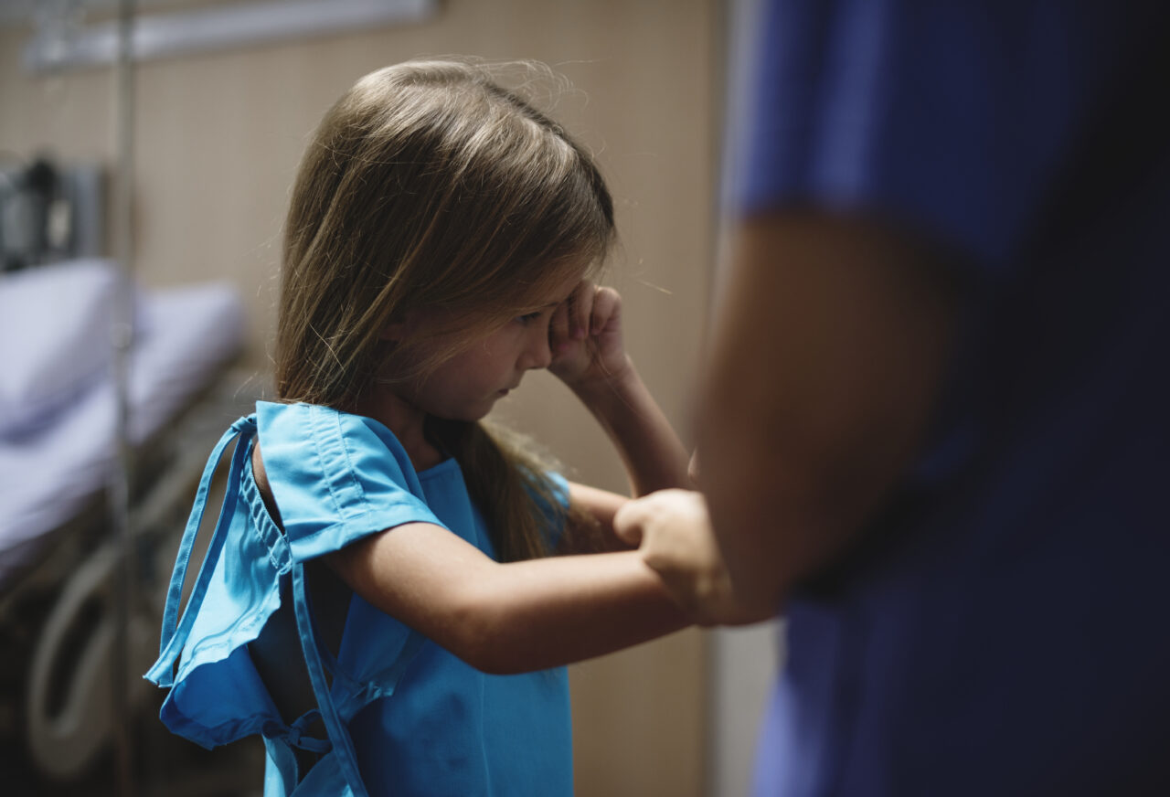 Young Caucasian girl staying at a hospital