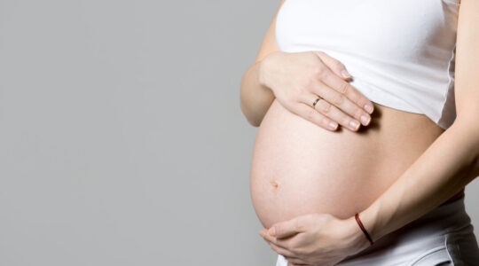 Mom-to-be, close-up of belly