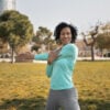 senior-woman-doing-yoga-outdoors-park