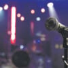Close up microphone on blurred background with bokeh.