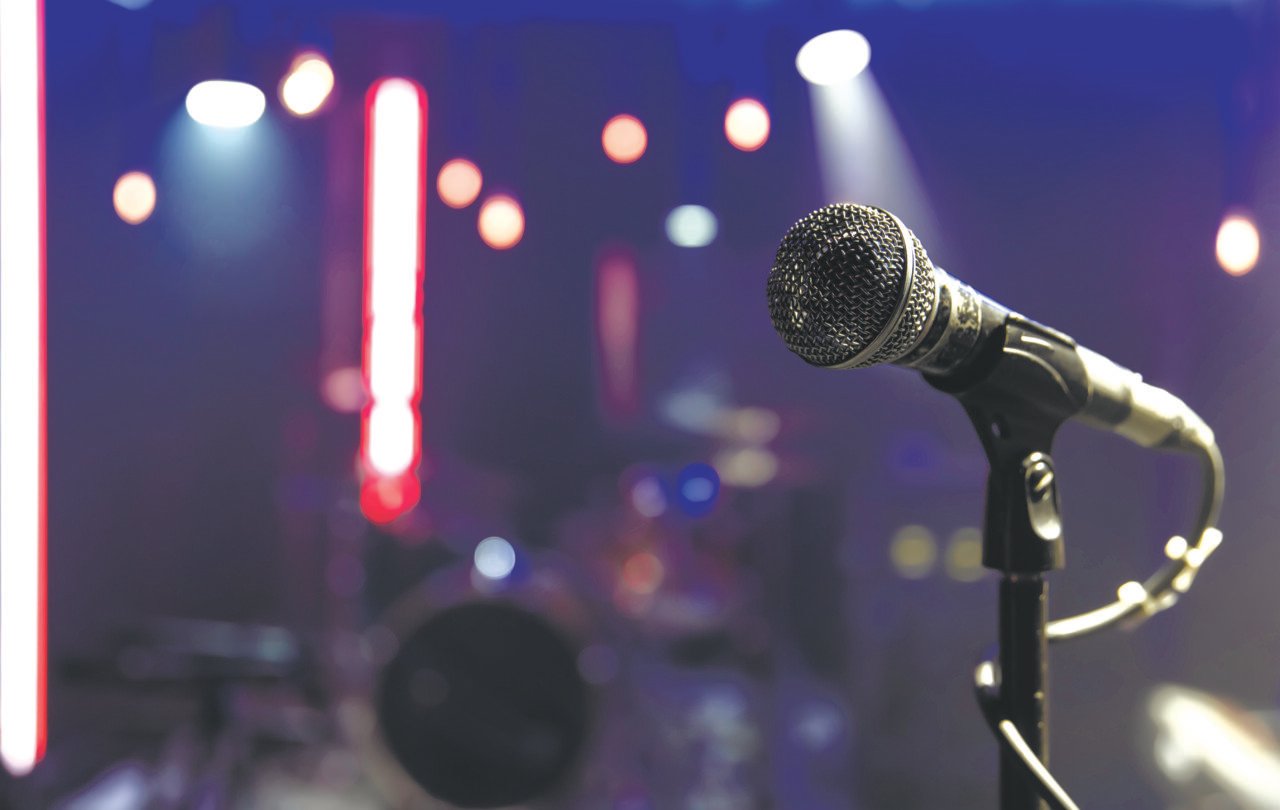 Close up microphone on blurred background with bokeh.