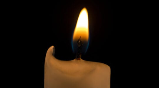 Candle light background, realistic flame, high resolution image