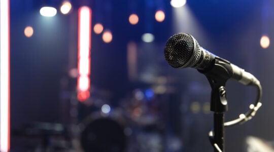 Close up microphone on blurred background with bokeh.