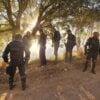Policiais na Represa do Passaúna, no local do corpo encontrado