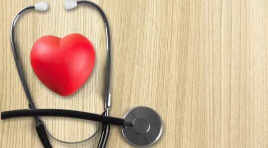 Near,The,Stethoscope,Lies,A,Heart,On,The,Desk