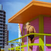 Young woman in black swimsuit on the beach Miami Florida USA nea
